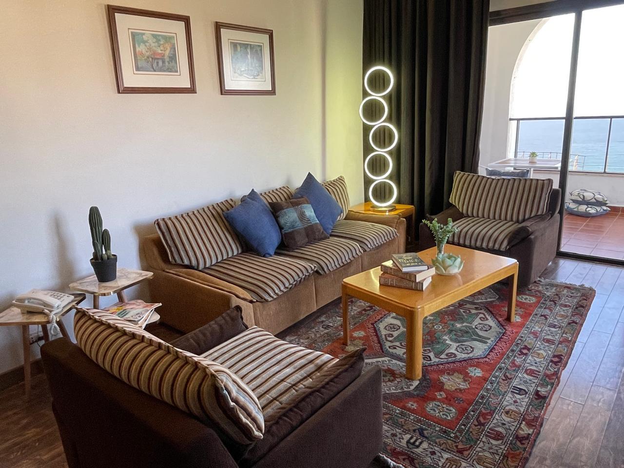 Family Suite at Marbella Hotel - cozy lounge area with modern decor and comfortable seating